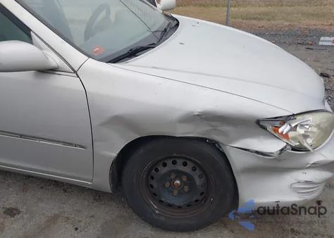 2003 Toyota Camry Le from USA, damaged, VIN 4T1BE32K13U765141